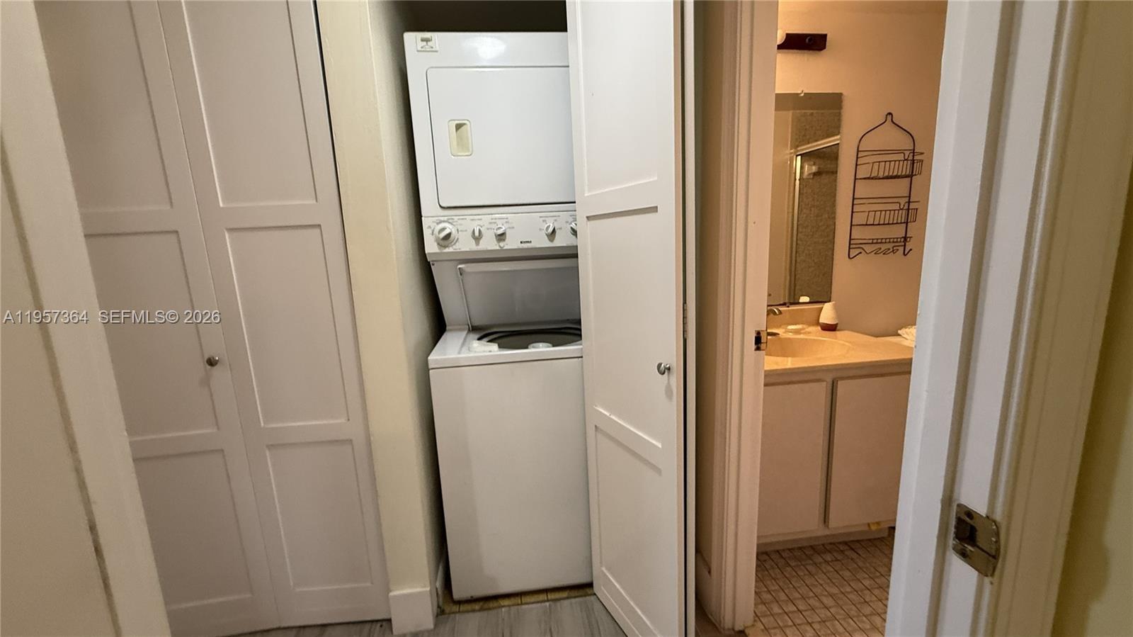 6800 Cypress Road, Unit 501 Plantation, FL 33317 - Photo 7 of 40 a view of bathroom with a washer and dryer