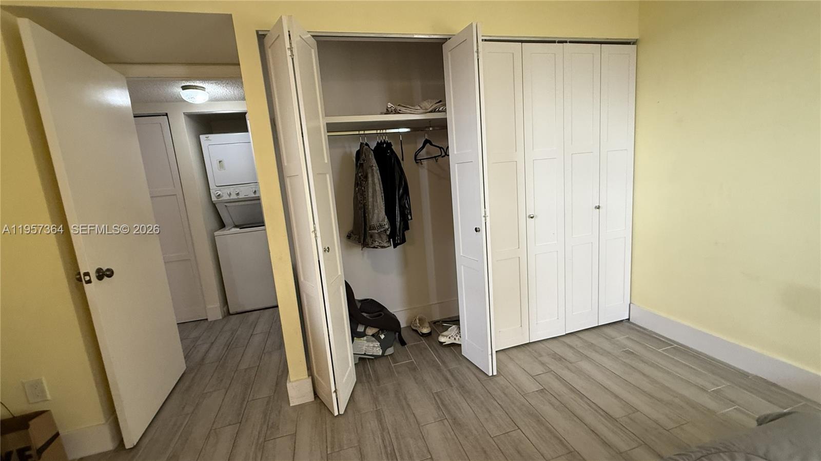 6800 Cypress Road, Unit 501 Plantation, FL 33317 - Photo 10 of 40 a view of a hallway with wooden floor and staircase
