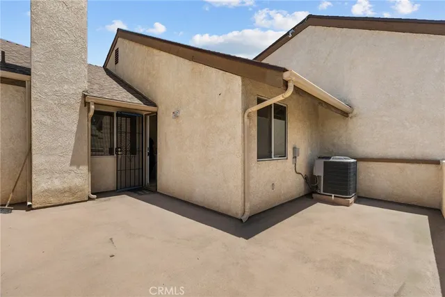 a view of gym equipment with racks