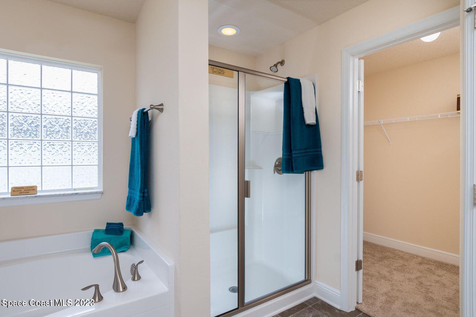 362 Garvey Road Palm Bay, FL 32908 - Photo 12 of 16 a bathroom with a tub and shower