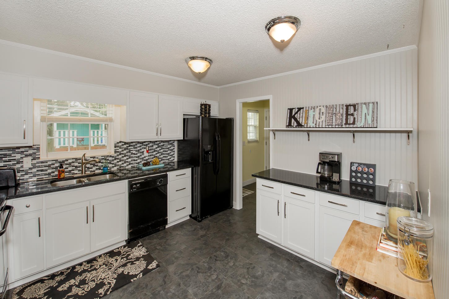 1118 Ridgeway Circle Athens, TN 37303 - Photo 13 of 30 a kitchen with stainless steel appliances a sink stove and refrigerator