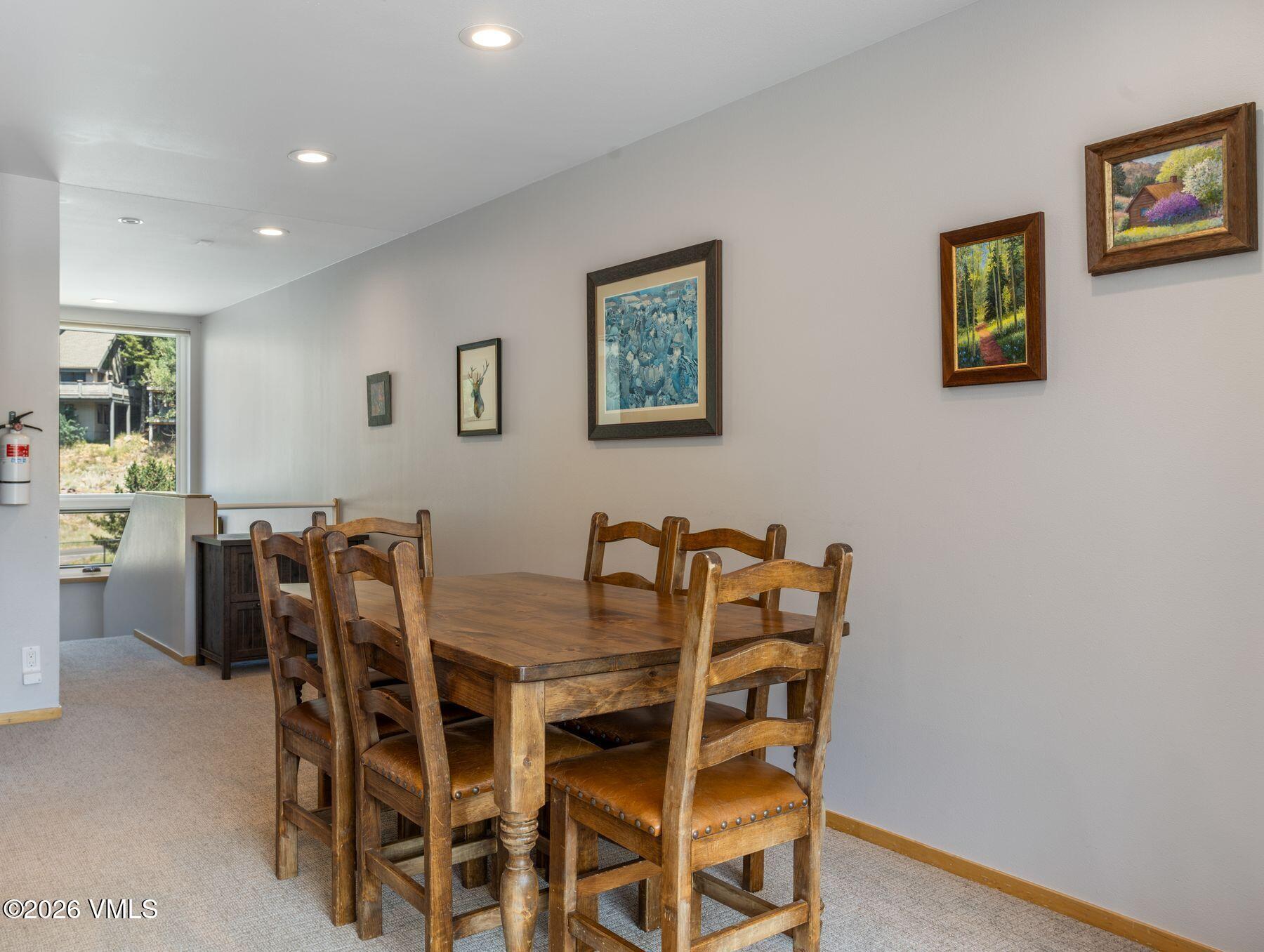 1100 North Frontage Road West, Unit 1503 Vail, CO 81657 - Photo 16 of 32 a view of a dining room with furniture
