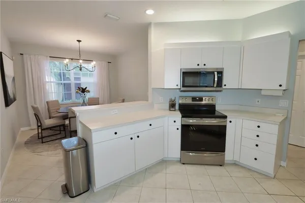 a kitchen with a stove and a sink