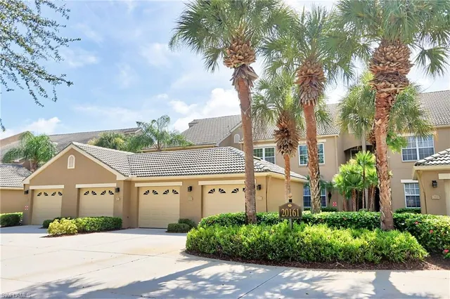 front view of a house with a garden