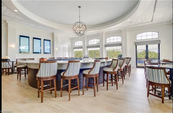a view of a dining room with furniture window and outside view