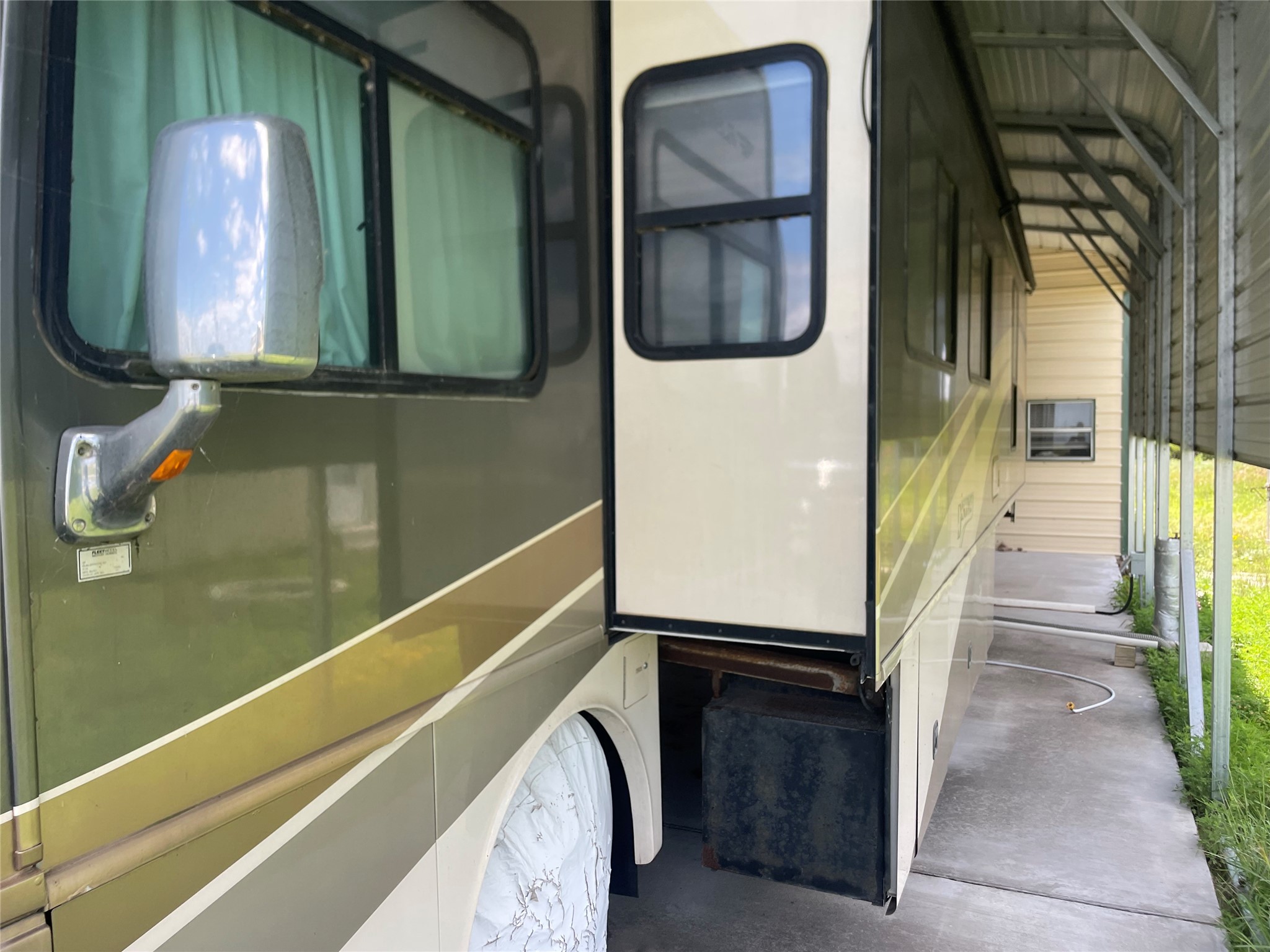 576 Ladyfish Road Palacios, TX 77465 - Photo 12 of 29 a view of a door and car parked