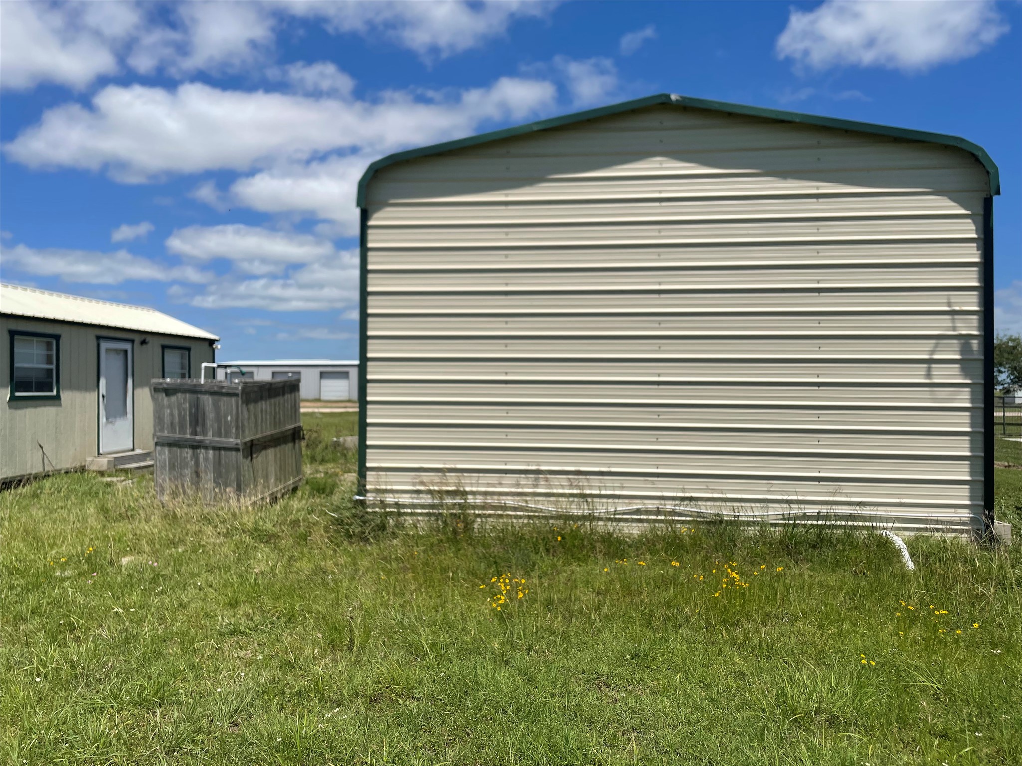 576 Ladyfish Road Palacios, TX 77465 - Photo 24 of 29 a view of a back yard of the house