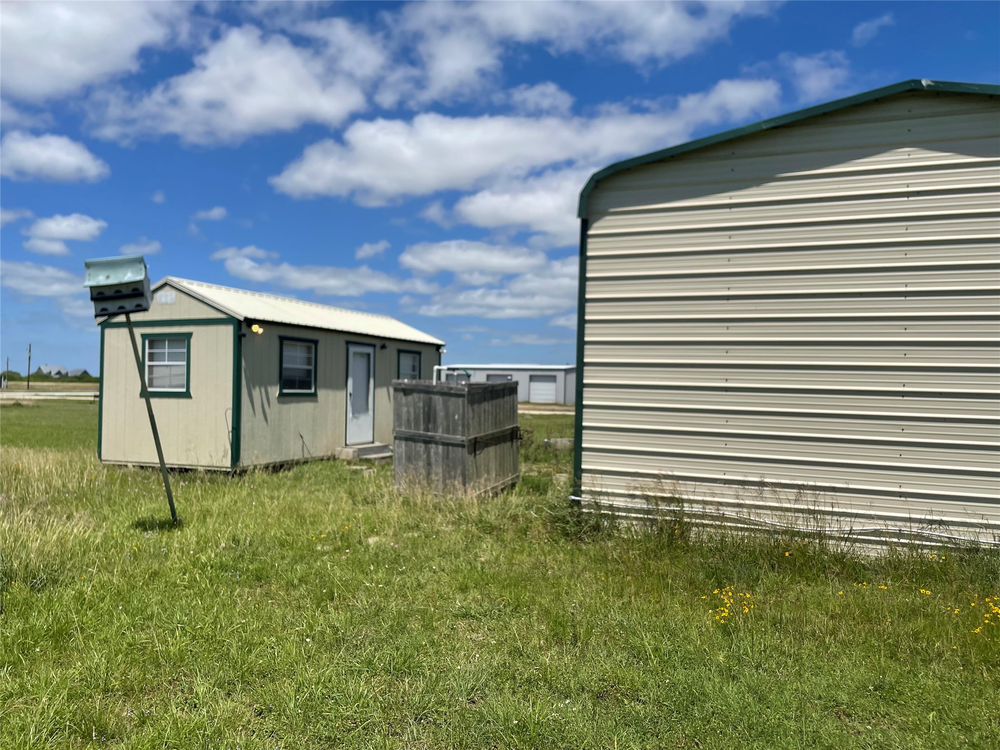 576 Ladyfish Road Palacios, TX 77465 - Photo 25 of 29 a backyard of a house with lots of green space