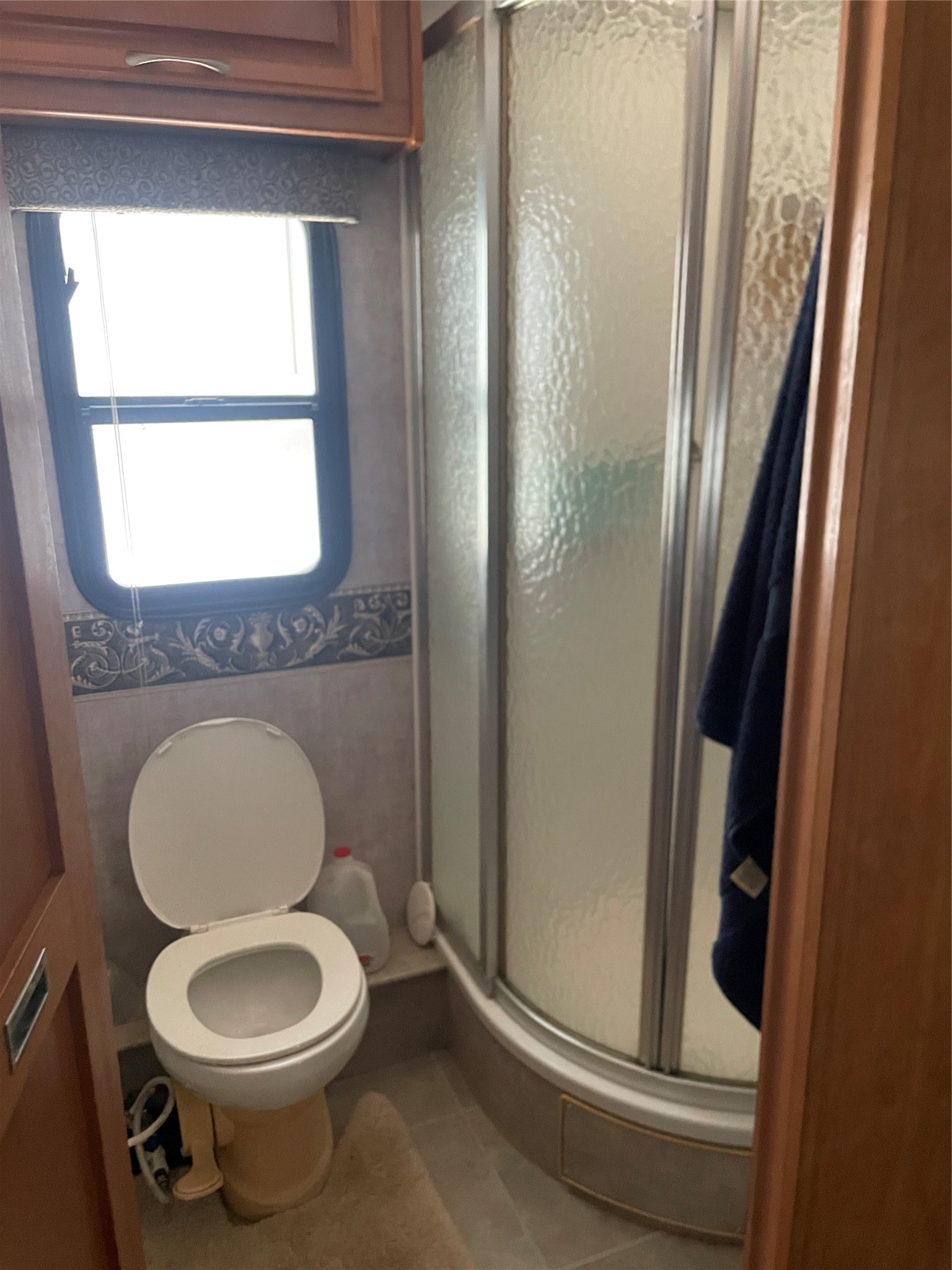 576 Ladyfish Road Palacios, TX 77465 - Photo 10 of 29 a bathroom with a toilet and a shower