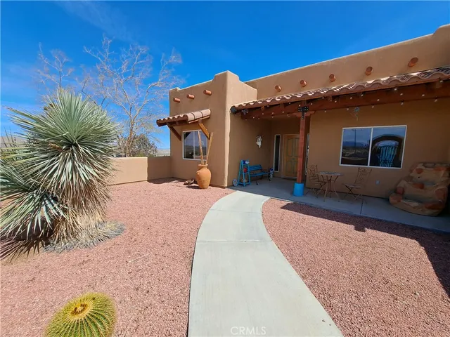 a view of a house with a swimming pool