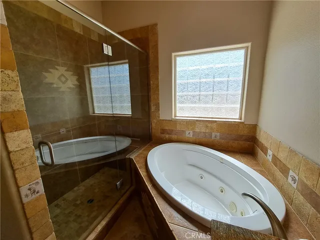 a kitchen with a sink stove and refrigerator