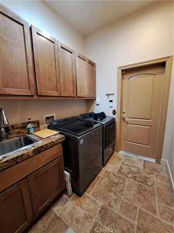 a view of a backyard of the house