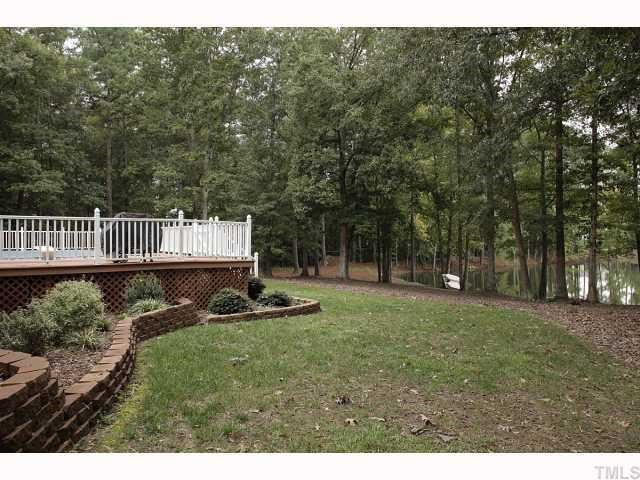 2900 Adrian Court Raleigh, NC 27604 - Photo 2 of 18 Backyard with built-in pool that backs to lake! Enjoy an afternoon fishing and swimming! Back Yard