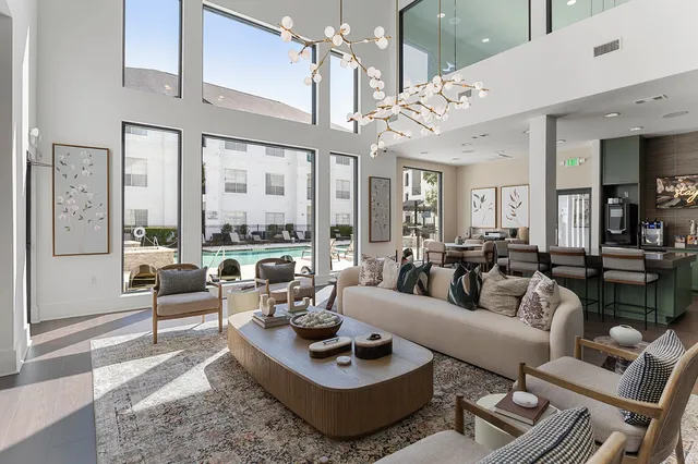 a view of a swimming pool with a patio