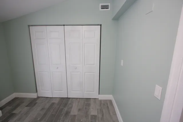 a view of room with hardwood floor