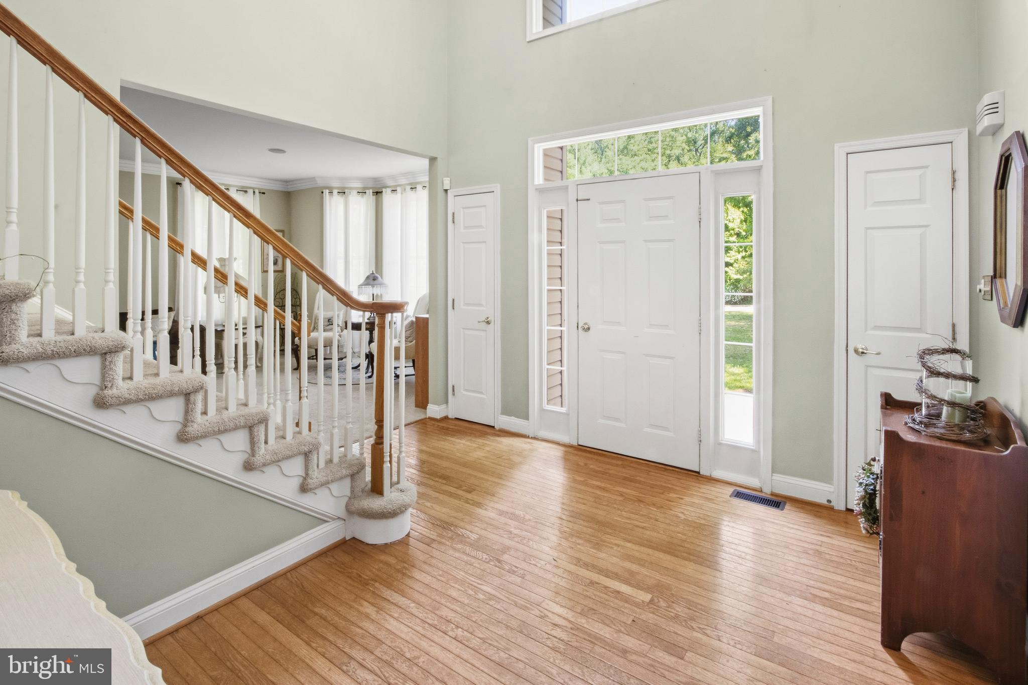 15 Hollybrook Road Mullica Hill, NJ 08062 - Photo 8 of 38 a view of an entryway with wooden floor and door