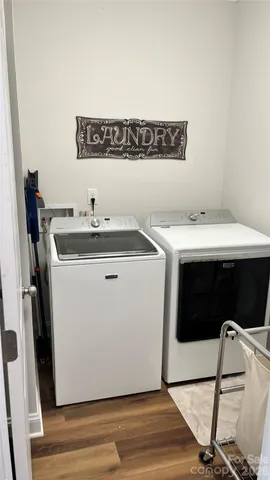 a utility room with washer and dryer