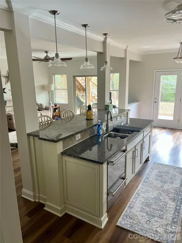 a kitchen with sink and window