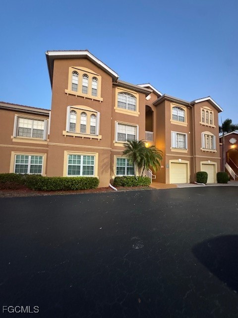 15605 Ocean Walk Circle, Unit 301 Fort Myers, FL 33908 - Photo 2 of 28 a front view of a building