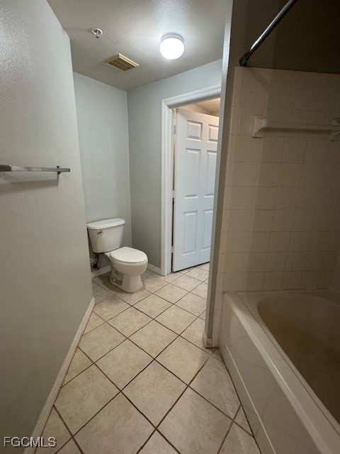 15605 Ocean Walk Circle, Unit 301 Fort Myers, FL 33908 - Photo 21 of 28 a bathroom with a sink and a toilet