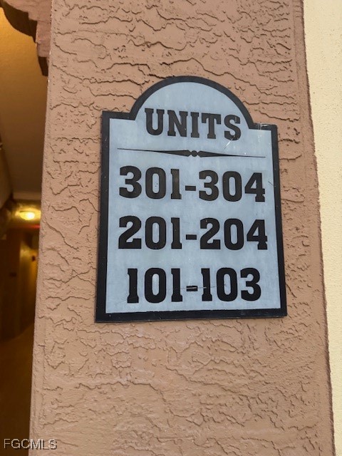 15605 Ocean Walk Circle, Unit 301 Fort Myers, FL 33908 - Photo 4 of 28 a view of wooden door
