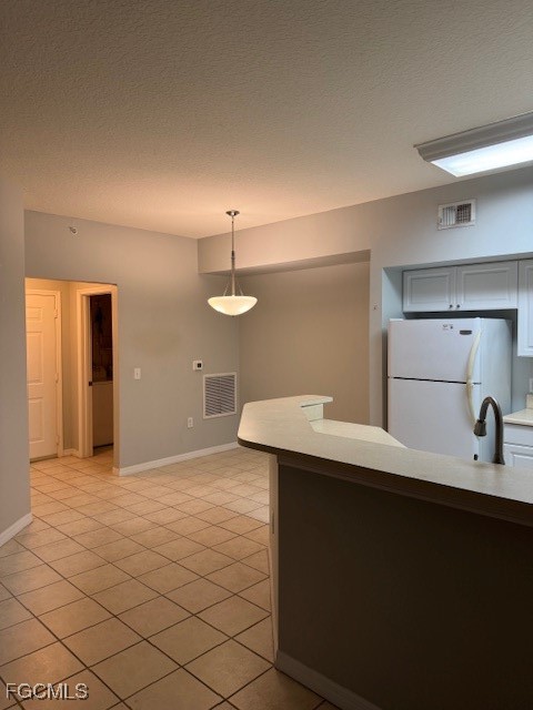 15605 Ocean Walk Circle, Unit 301 Fort Myers, FL 33908 - Photo 9 of 28 a kitchen with a sink cabinets and appliances