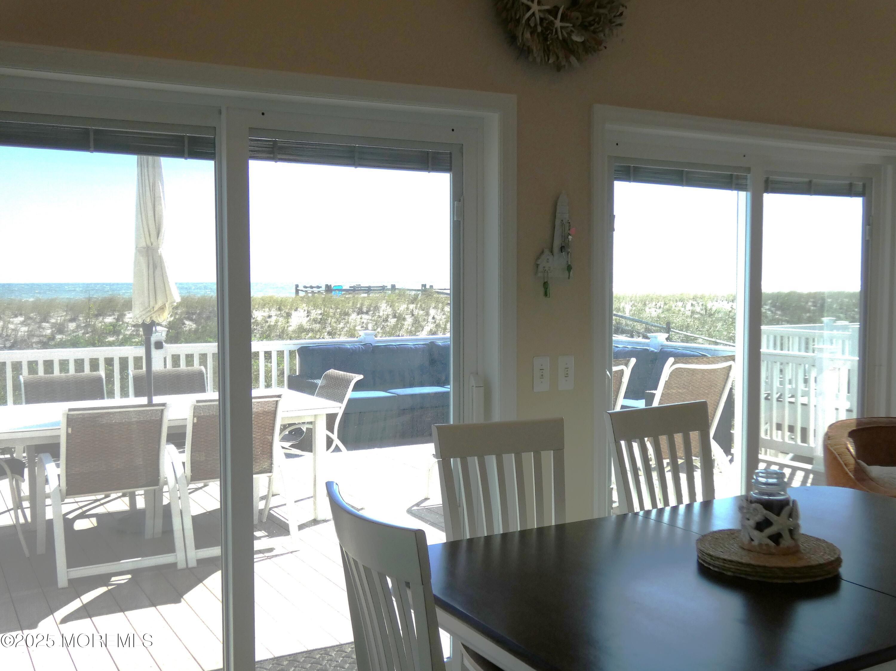 3420 Seaview Road Lavallette, NJ 08735 - Photo 11 of 44 a view of a dining room with furniture window and outside view