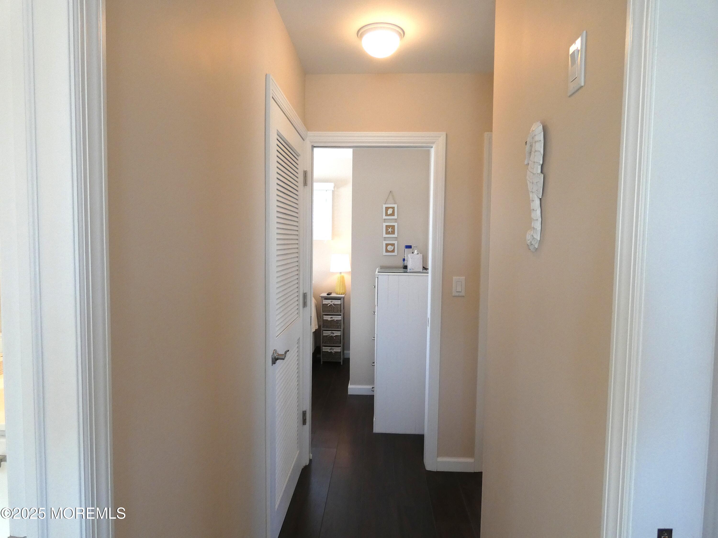 3420 Seaview Road Lavallette, NJ 08735 - Photo 14 of 44 a view of a bathroom from a hallway