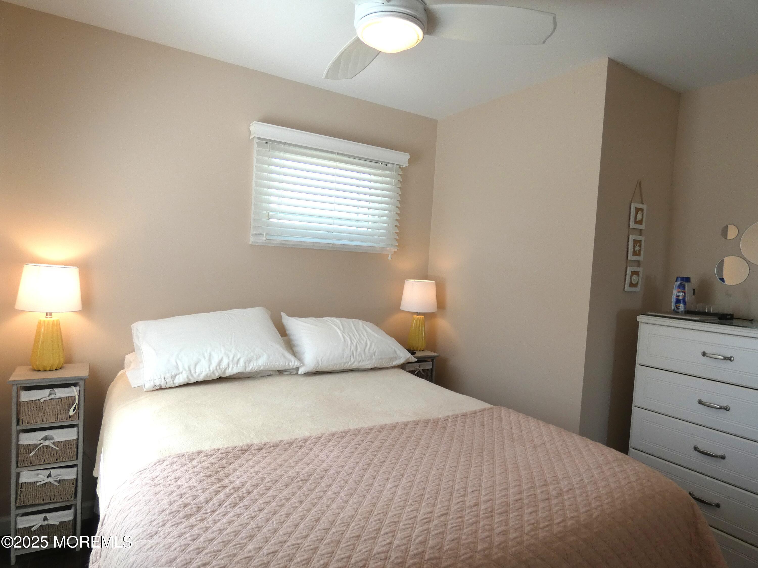 3420 Seaview Road Lavallette, NJ 08735 - Photo 17 of 44 a bedroom with a bed and a closet