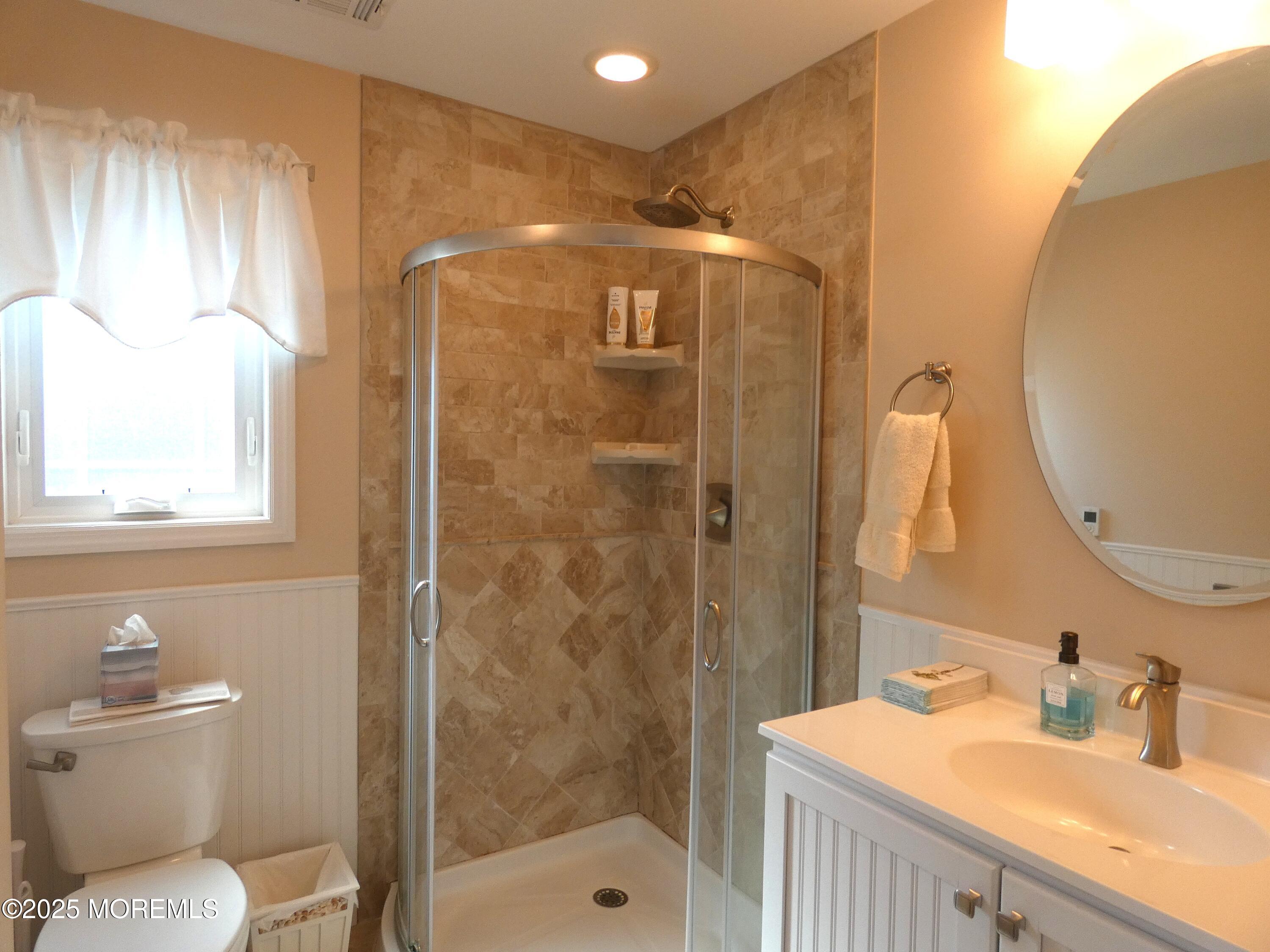 3420 Seaview Road Lavallette, NJ 08735 - Photo 24 of 44 a bathroom with a granite countertop sink toilet and shower