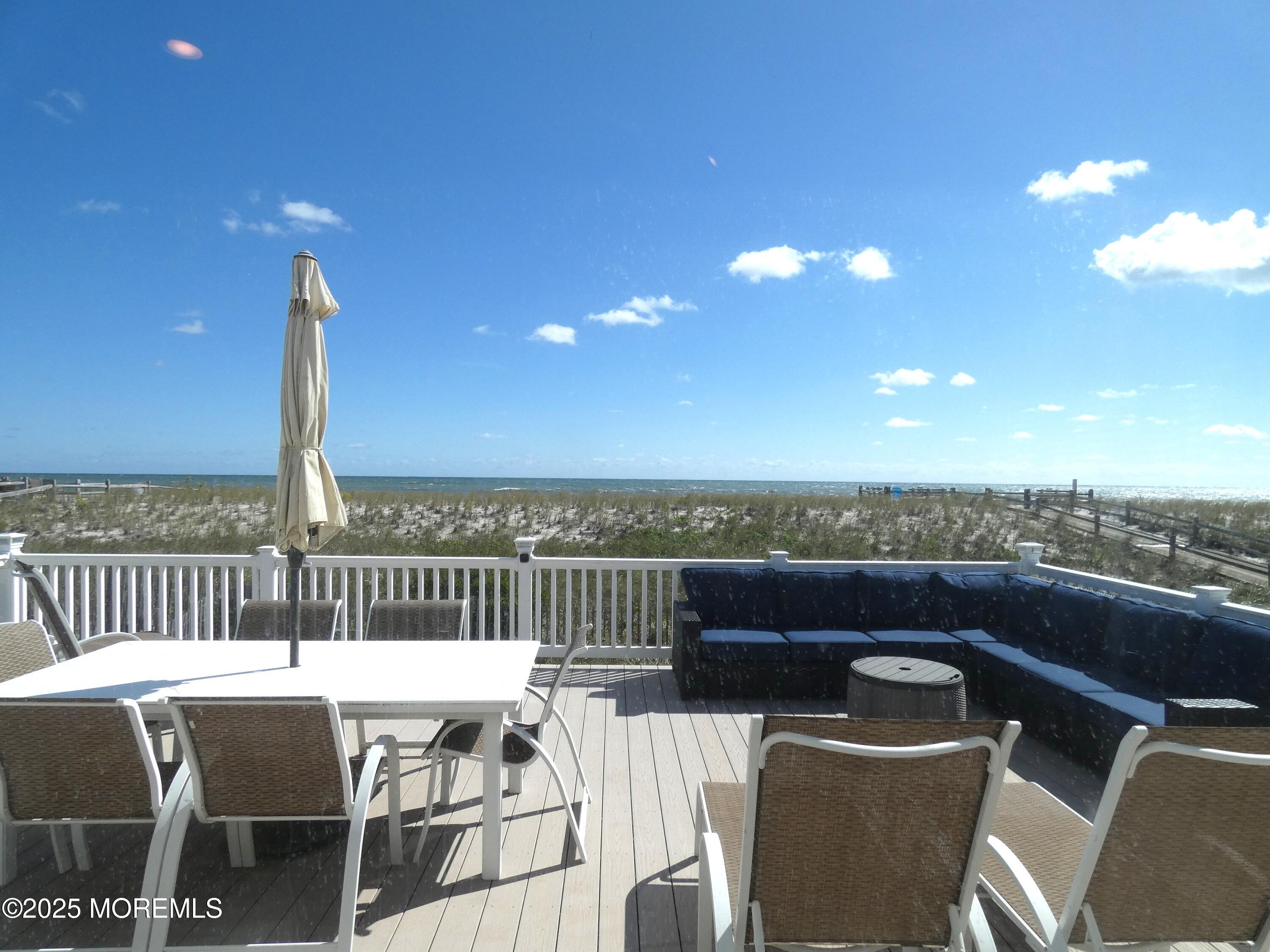 3420 Seaview Road Lavallette, NJ 08735 - Photo 27 of 44 a view of a roof deck with couches