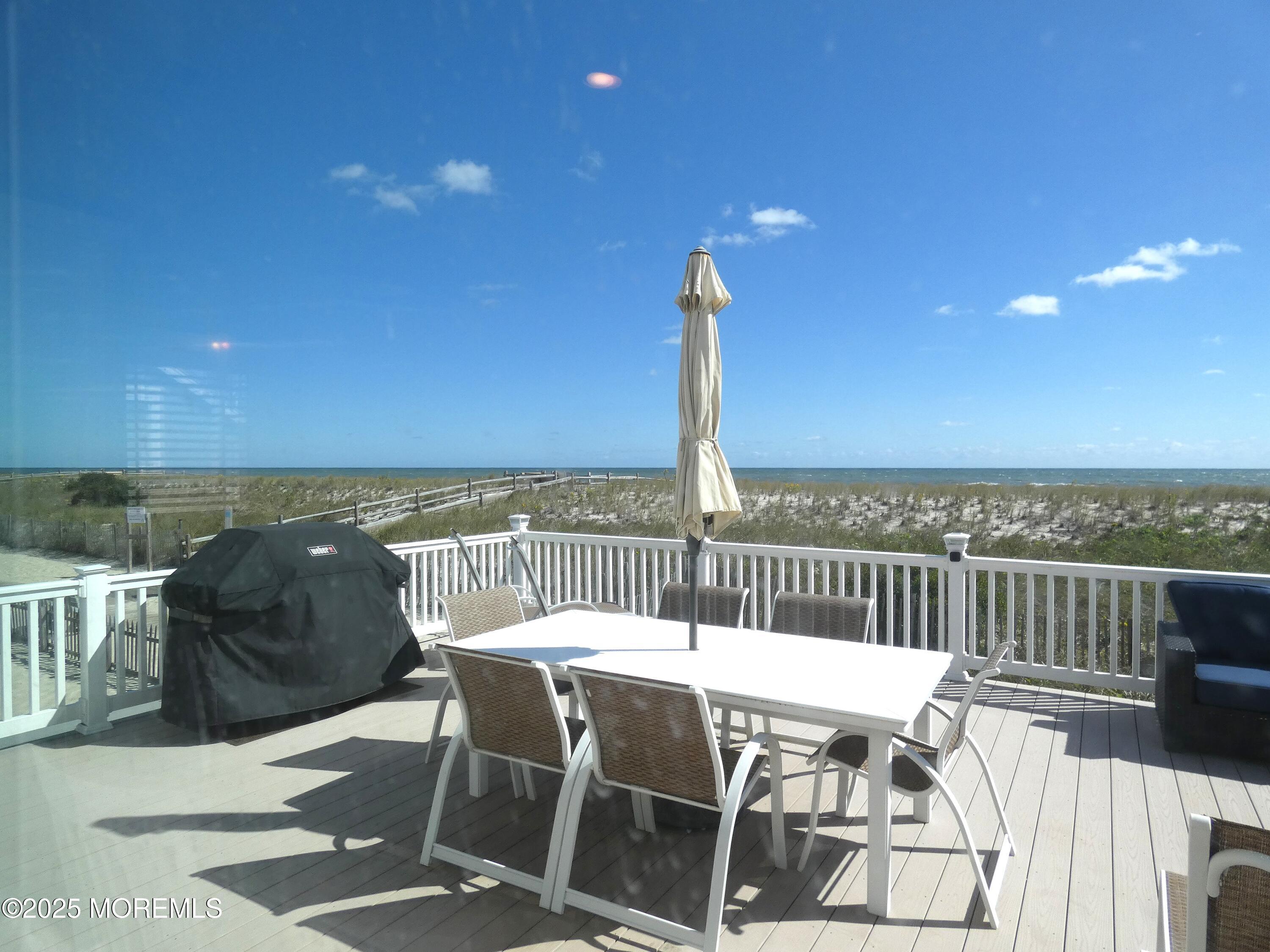 3420 Seaview Road Lavallette, NJ 08735 - Photo 28 of 44 a view of a chairs and table on the terrace