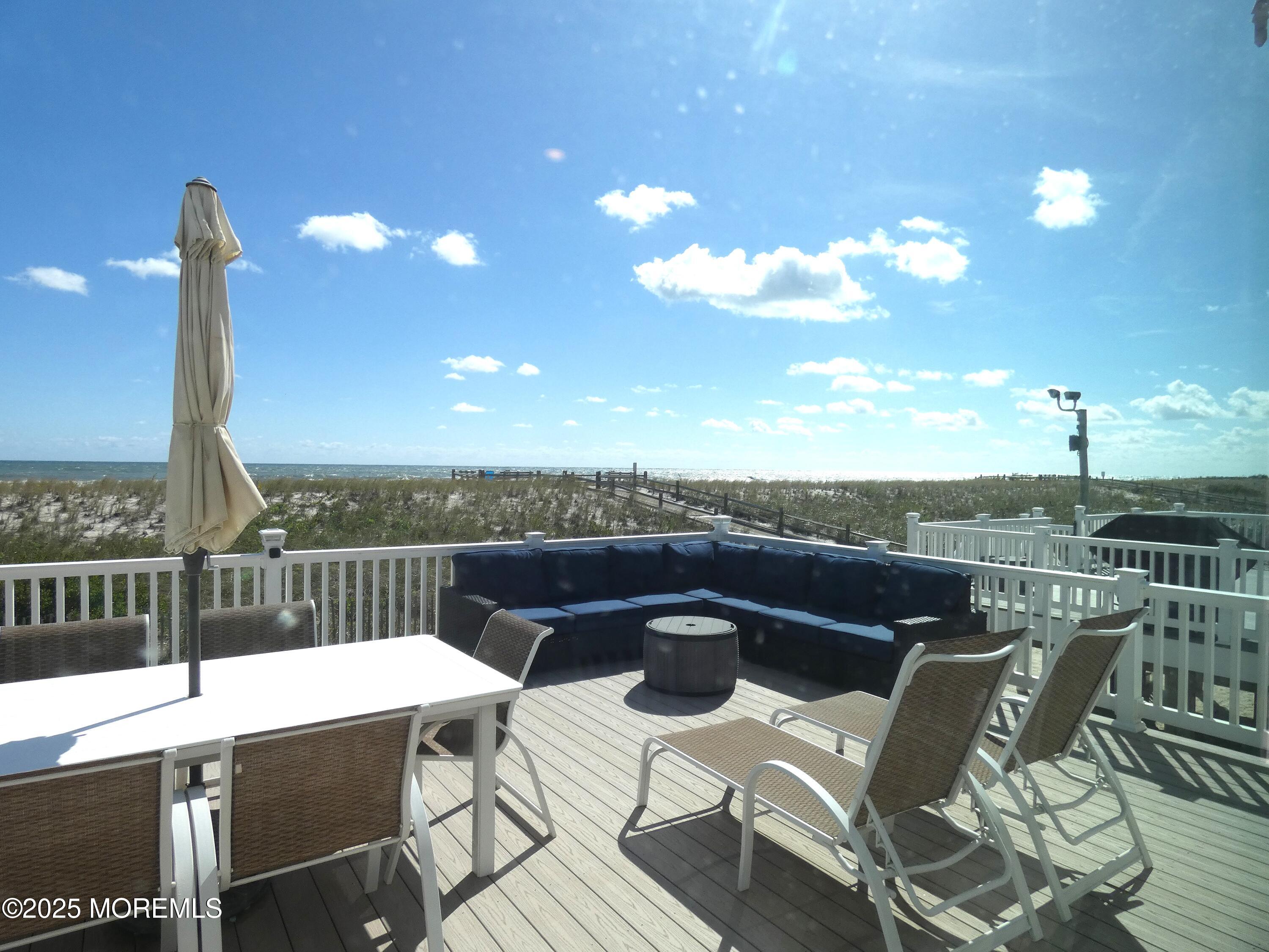 3420 Seaview Road Lavallette, NJ 08735 - Photo 29 of 44 a view of a terrace with furniture and stove