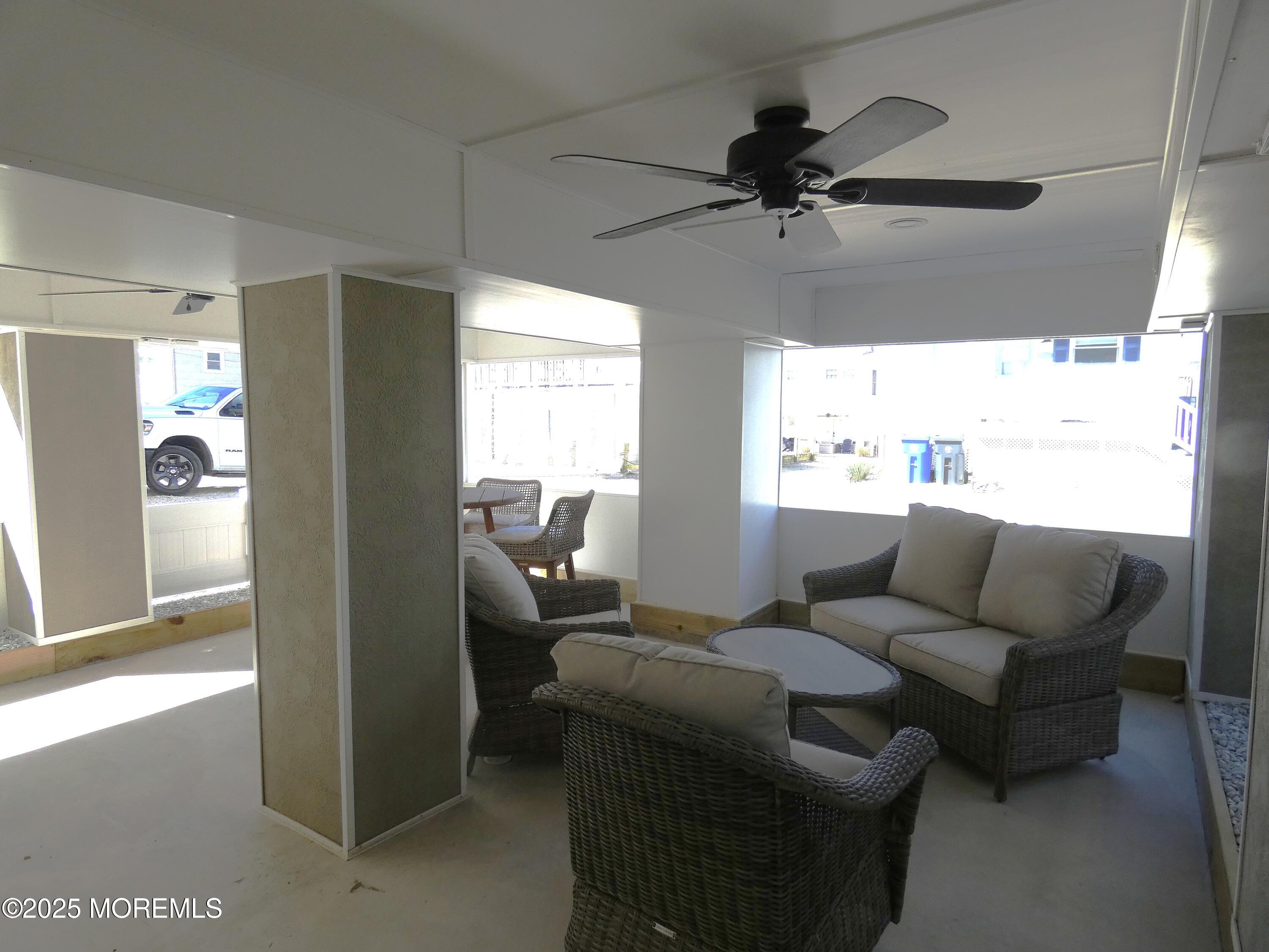 3420 Seaview Road Lavallette, NJ 08735 - Photo 33 of 44 a living room with furniture and a window