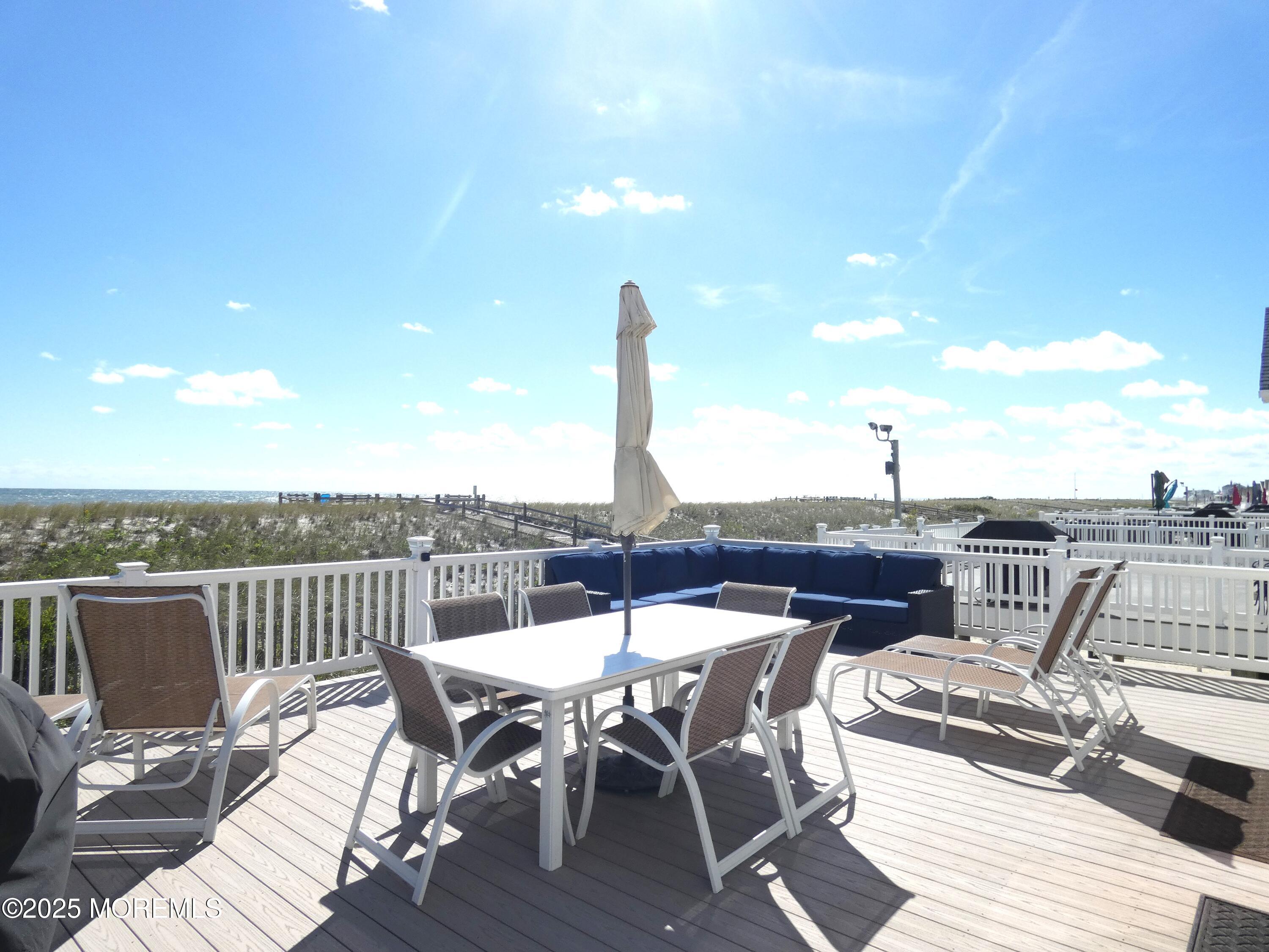 3420 Seaview Road Lavallette, NJ 08735 - Photo 37 of 44 a view of a terrace with furniture and sitting area