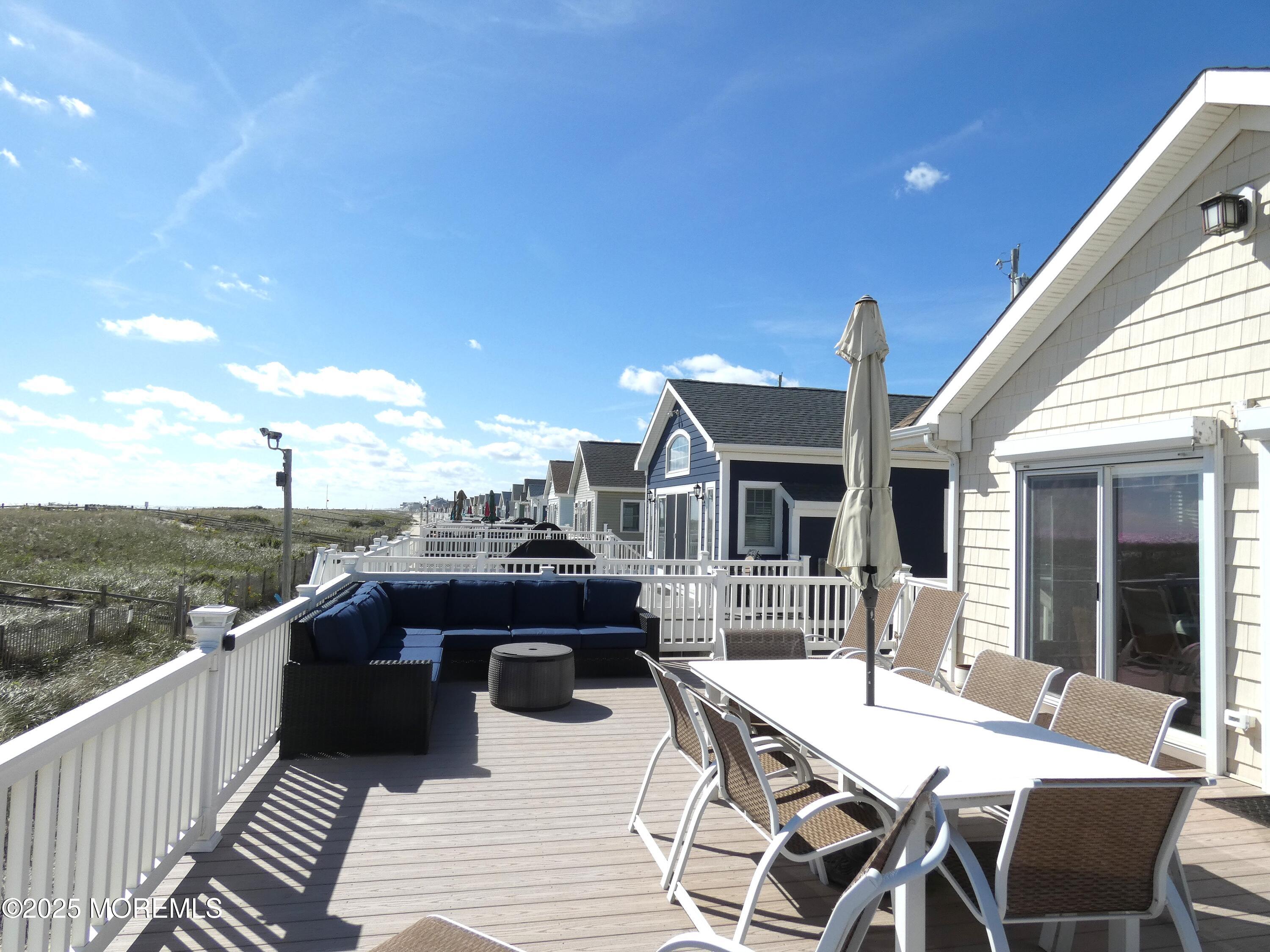 3420 Seaview Road Lavallette, NJ 08735 - Photo 40 of 44 a view of a roof deck with furniture