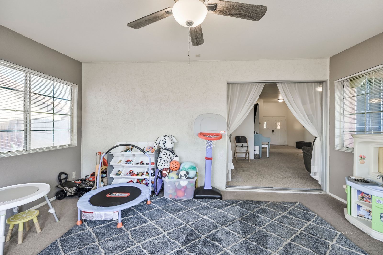 404 Veada Avenue Ridgecrest, CA 93555 - Photo 13 of 33 a view of a room with lots of stuff and furniture