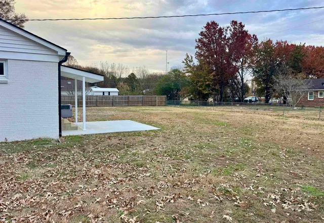 a view of a yard with an outdoor space