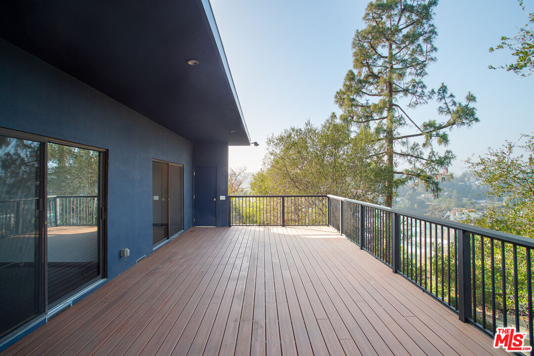 1925 Walcott Way Los Angeles, CA 90039 - Photo 13 of 27 a view of a balcony with wooden floor