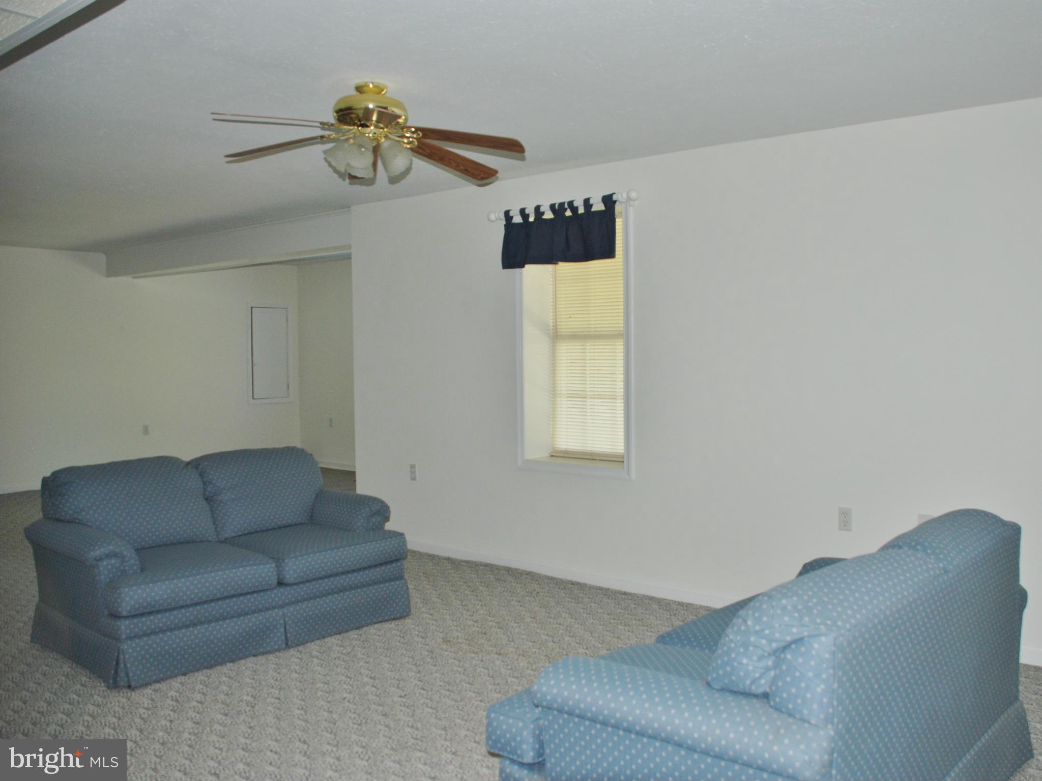 12375 Old Stillhouse Road Boston, VA 22713 - Photo 22 of 30 a living room with furniture and a window
