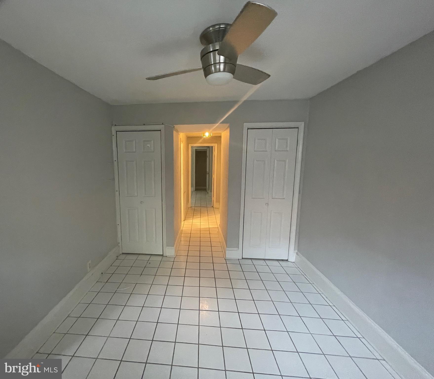 a view of an empty room and window