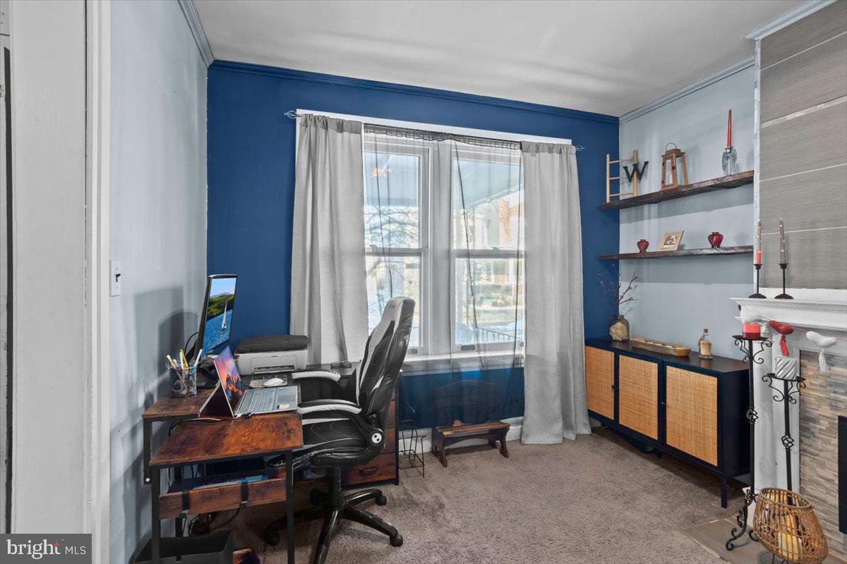 128 East Ross Street Lancaster, PA 17602 - Photo 12 of 36 a view of a workspace with furniture and a window