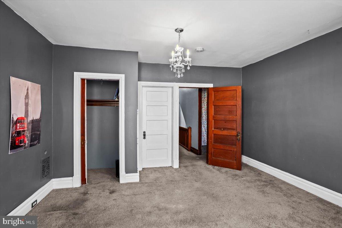 128 East Ross Street Lancaster, PA 17602 - Photo 26 of 36 wooden floor in an empty room with a window