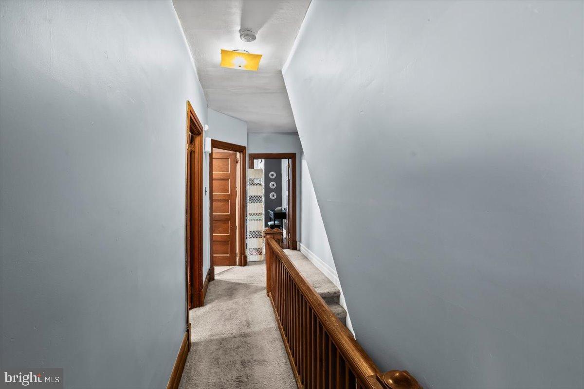 128 East Ross Street Lancaster, PA 17602 - Photo 27 of 36 a view of a hallway and stairs