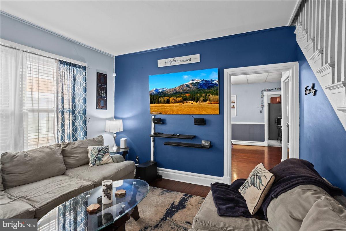 128 East Ross Street Lancaster, PA 17602 - Photo 8 of 36 a living room with furniture and a flat screen tv