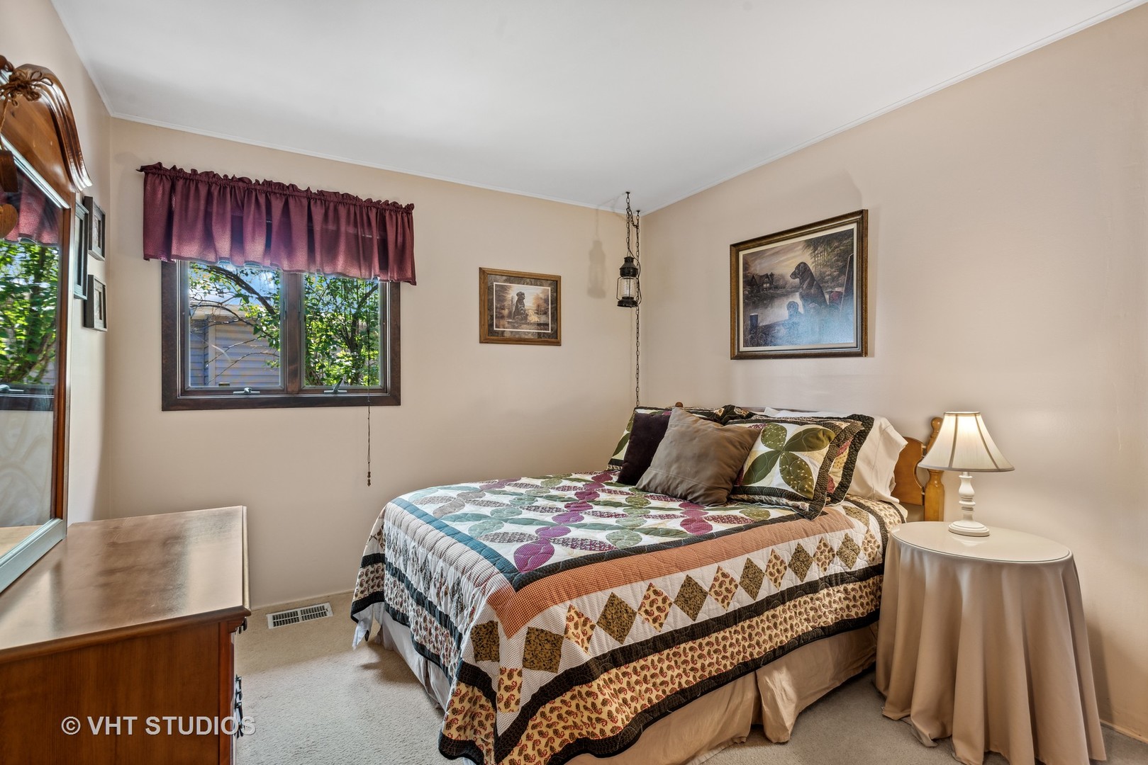 3607 Wren Lane Rolling Meadows, IL 60008 - Photo 13 of 23 a bedroom with a bed and a painting on the wall