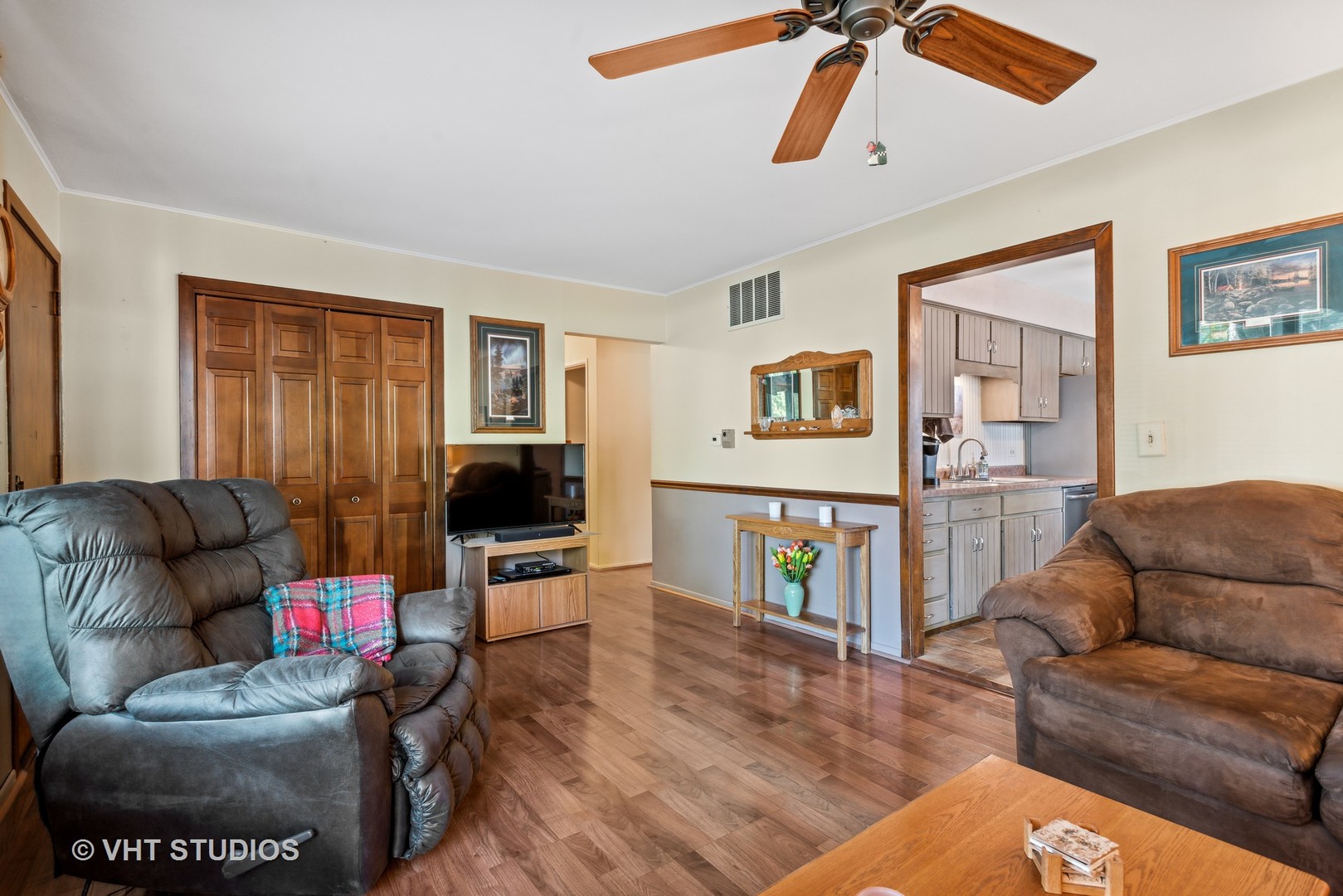 3607 Wren Lane Rolling Meadows, IL 60008 - Photo 4 of 23 a living room with furniture and a flat screen tv