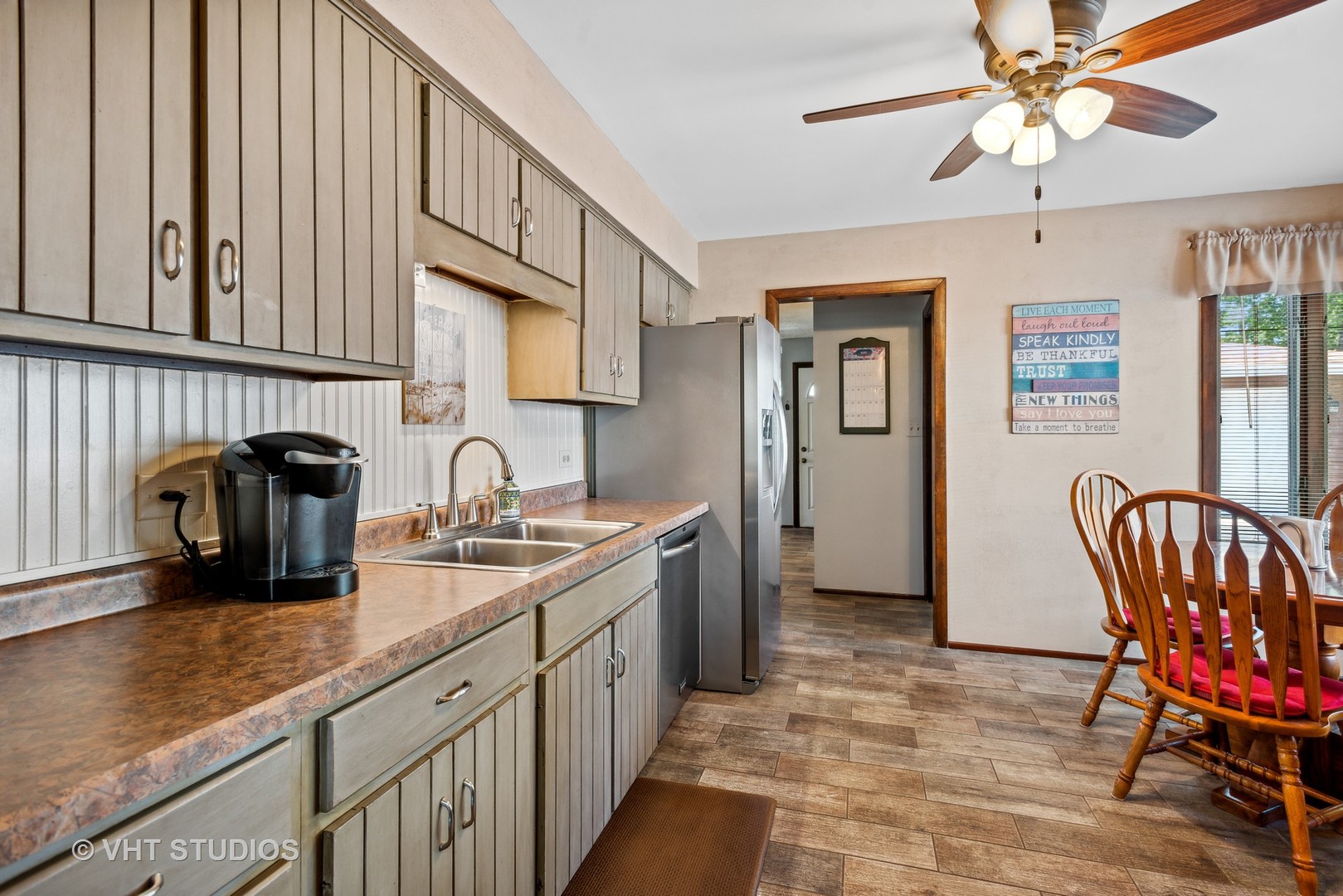 3607 Wren Lane Rolling Meadows, IL 60008 - Photo 5 of 23 a kitchen with stainless steel appliances granite countertop a sink and a refrigerator