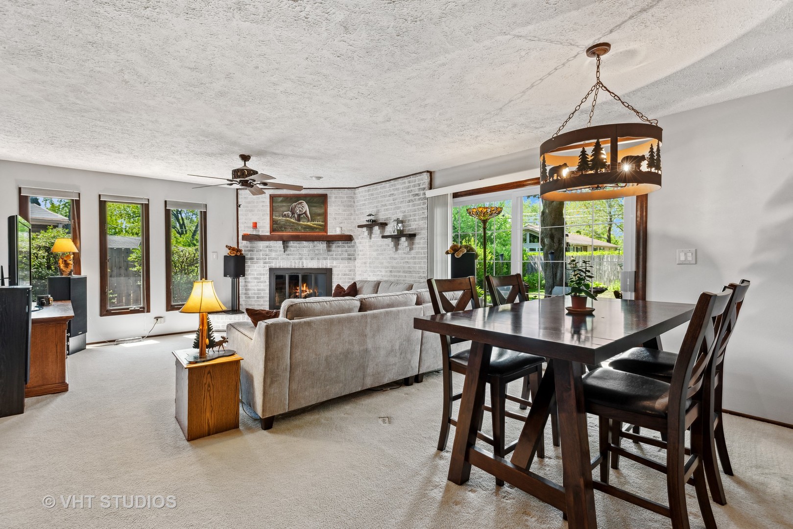 3607 Wren Lane Rolling Meadows, IL 60008 - Photo 9 of 23 a dining room with furniture a chandelier and window
