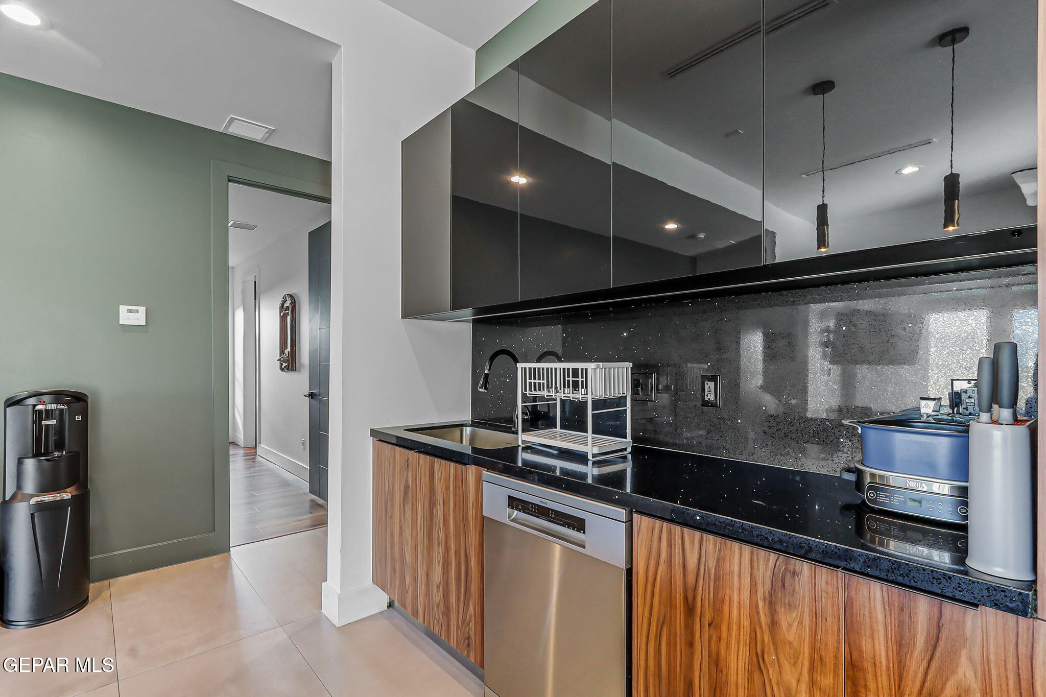 329 Rio Del Rancho Court El Paso, TX 79932 - Photo 15 of 52 a large kitchen with stainless steel appliances a large counter top